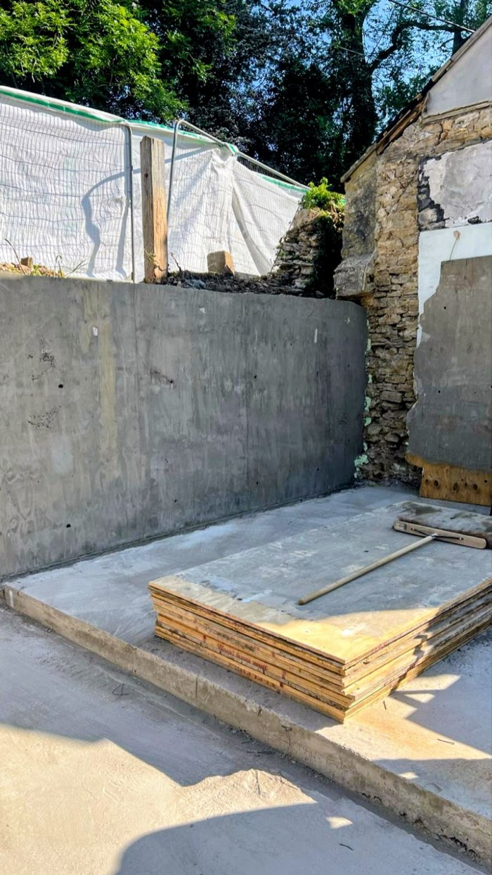 Concrete formwork on a building site at sunrise