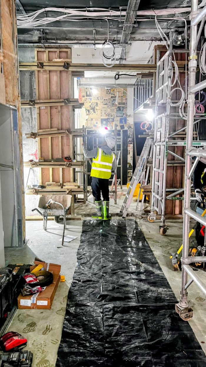 Worker in hi-vis carrying out interior formwork